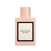 Refect Beauty Gucci Bloom Eau de Parfum in a pale pink rectangular bottle with a white label and black lettering.