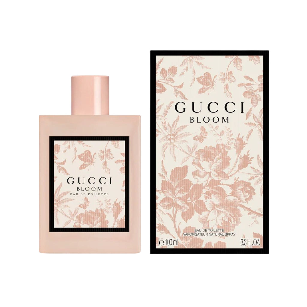 Refect Beauty Gucci Bloom Eau de Toilette perfume bottle and floral patterned box on a white background.