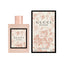Refect Beauty Gucci Bloom Eau de Toilette perfume bottle and floral patterned box on a white background.