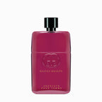 Refect Beauty Gucci Guilty Absolute Pour Femme eau de parfum in a deep berry-colored glass bottle with gold lettering.