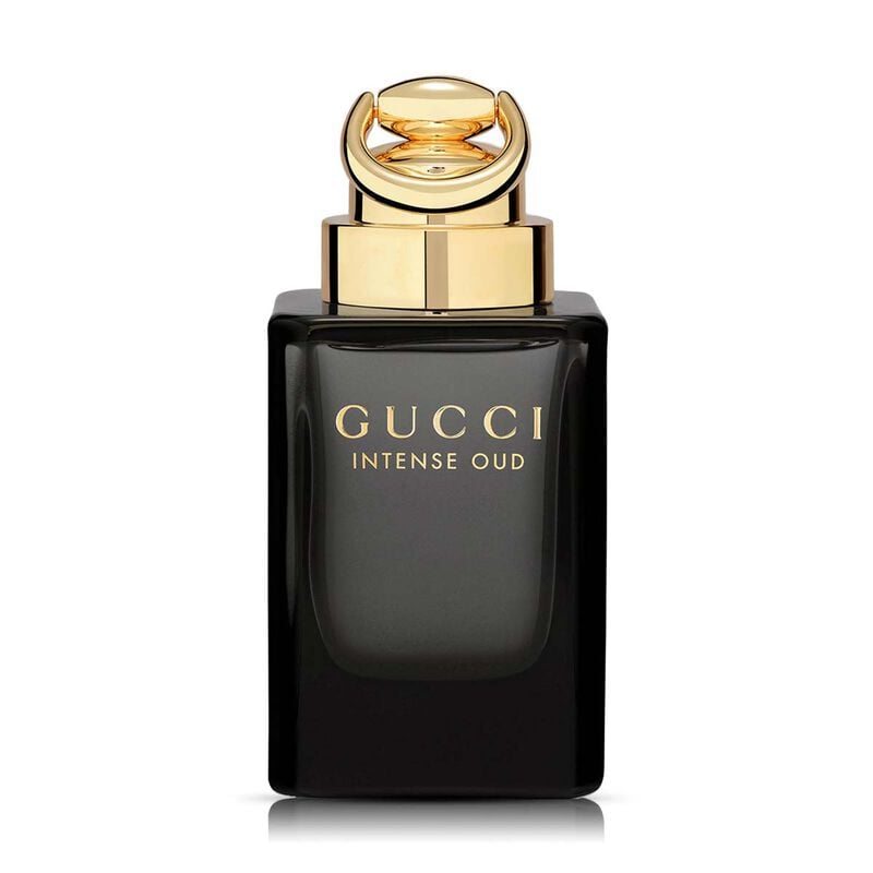 Refect Beauty Gucci Intense Oud Eau de Parfum in a dark translucent bottle with a luxurious gold cap and gold text.