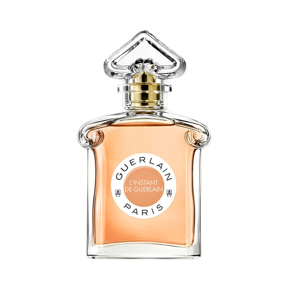 Refect Beauty Guerlain Instant de Guerlain Eau de Toilette in a clear glass bottle with a unique geometric cap.