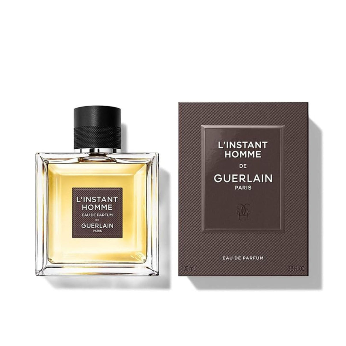 Refect Beauty Guerlain L'instant Homme Eau de Parfum bottle and box featuring a sophisticated woody amber scent.