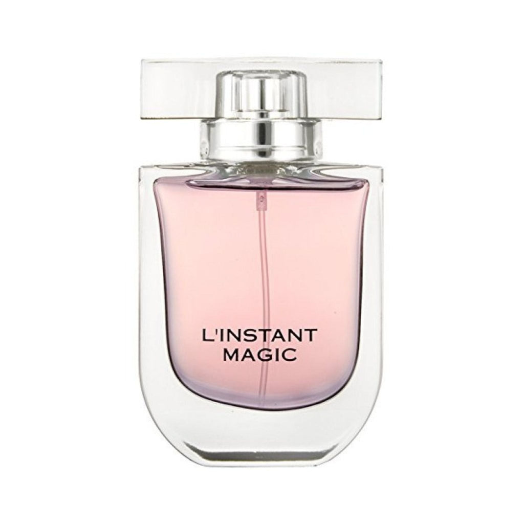 Refect Beauty Guerlain L’Instant Magic Eau de Parfum in a clear glass bottle with soft pink liquid and elegant cap.