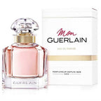 Refect Beauty Guerlain Mon Guerlain Eau de Parfum bottle with its matching white box featuring elegant gold accents.