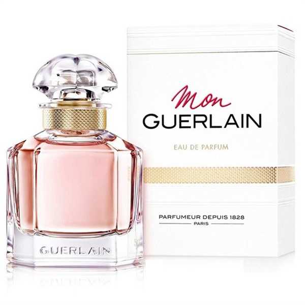 Refect Beauty Guerlain Mon Guerlain Eau de Parfum bottle with its matching white box featuring elegant gold accents.