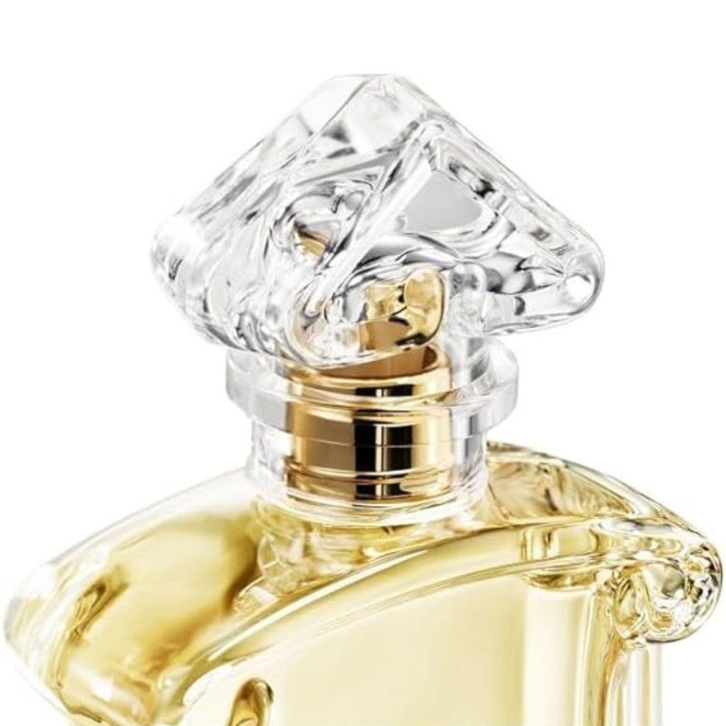Refect Beauty Guerlain Samsara Eau de Parfum bottle featuring a clear sculpted glass cap and golden spray nozzle