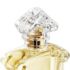 Refect Beauty Guerlain Samsara Eau de Parfum bottle featuring a clear sculpted glass cap and golden spray nozzle