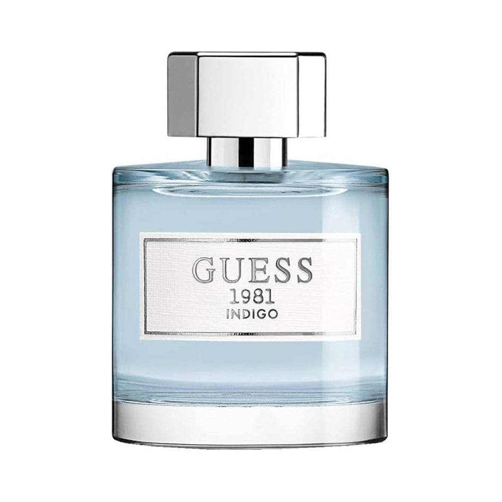 Refect Beauty Guess 1981 Indigo Eau de Toilette in a clear glass bottle with a silver cap and light blue fragrance.