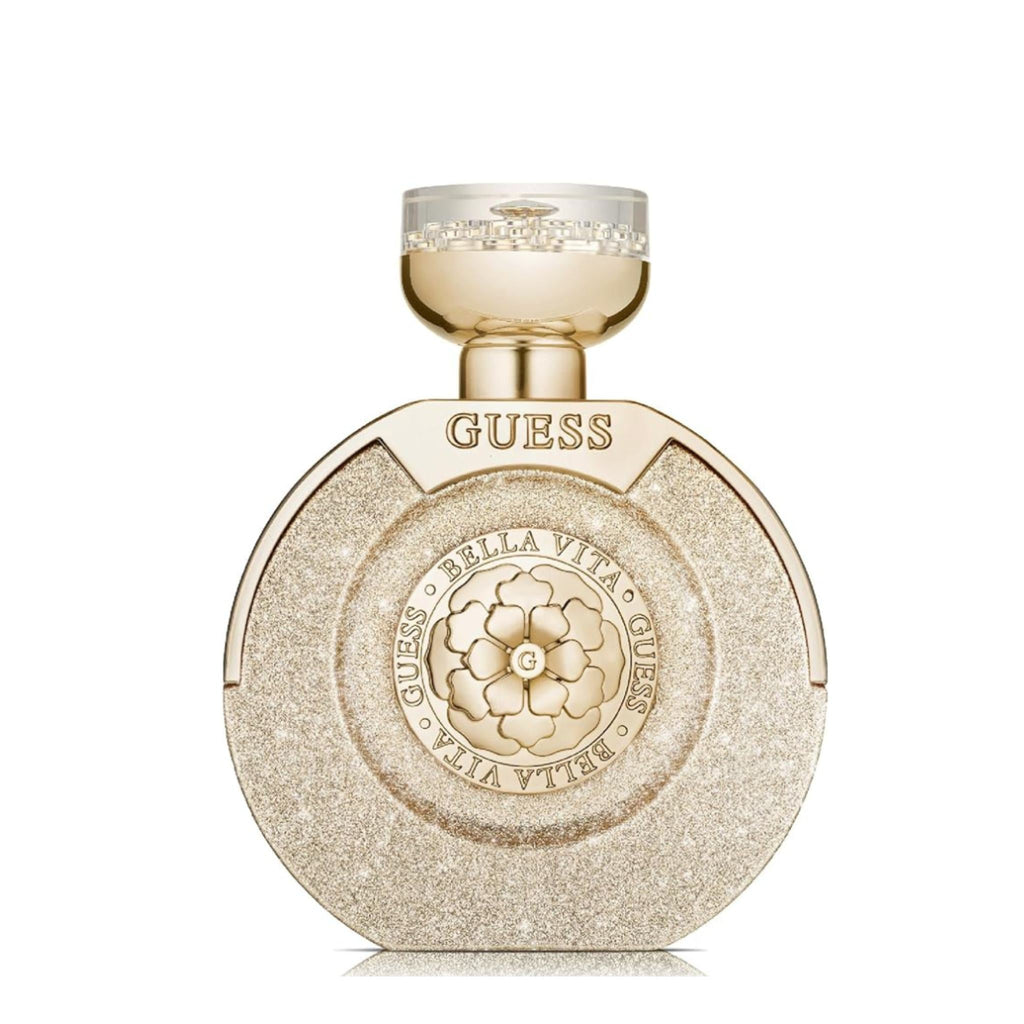 Refect Beauty Guess Bella Vita Paradiso eau de parfum in a round, shimmering gold bottle with a floral emblem.