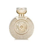 Refect Beauty Guess Bella Vita Paradiso eau de parfum in a round, shimmering gold bottle with a floral emblem.