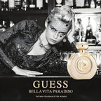Refect Beauty Guess Bella Vita Paradiso perfume bottle next to a glamorous woman in a sequin dress and veil