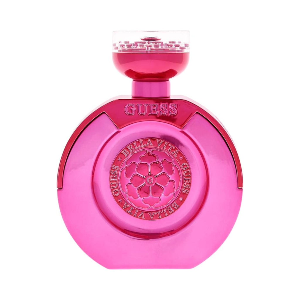 Refect Beauty Guess Bella Vita La Mia Eau de Parfum in a vibrant pink round glass bottle with a floral emblem.