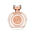 Refect Beauty Guess Bella Vita Rose Eau de Toilette in a round glass bottle with a rose gold floral emblem cap.