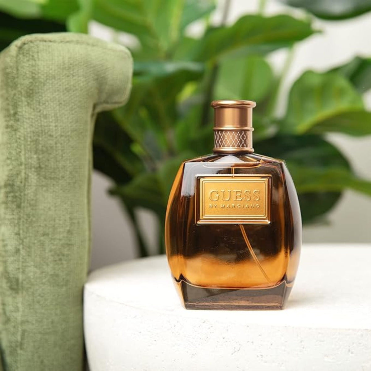 Refect Beauty Guess by Marciano Eau de Toilette for men in a sleek amber glass bottle with gold accents