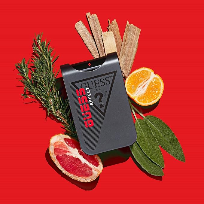 Refect Beauty Guess Effect Eau de Toilette bottle surrounded by fresh citrus, woody cedar, and aromatic herbs