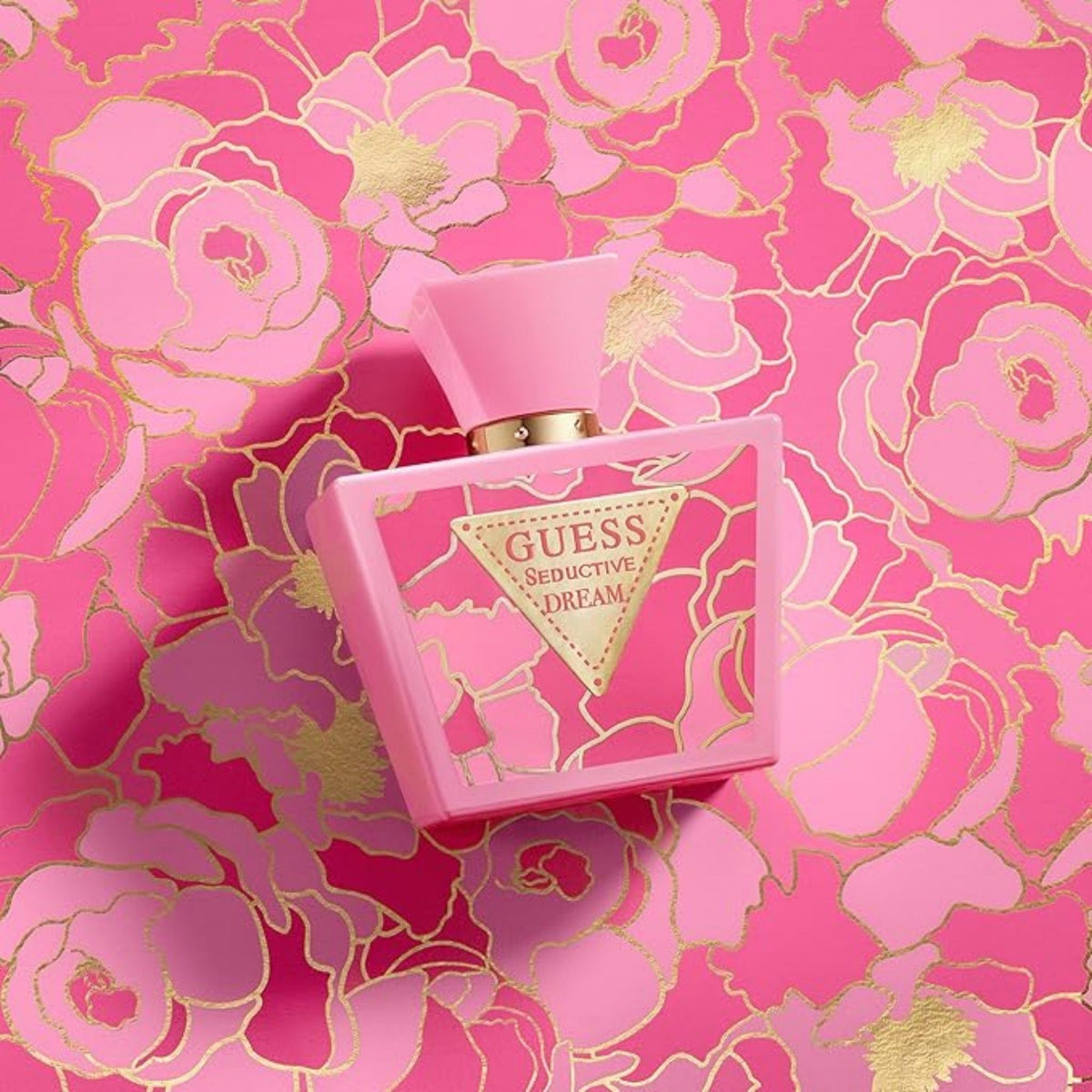Refect Beauty Guess Seductive Dream Eau de Toilette bottle in pink with gold floral background