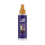 Refect Beauty The Hair Addict Musk Essence hair perfume mist in a clear bottle with a gold spray nozzle.