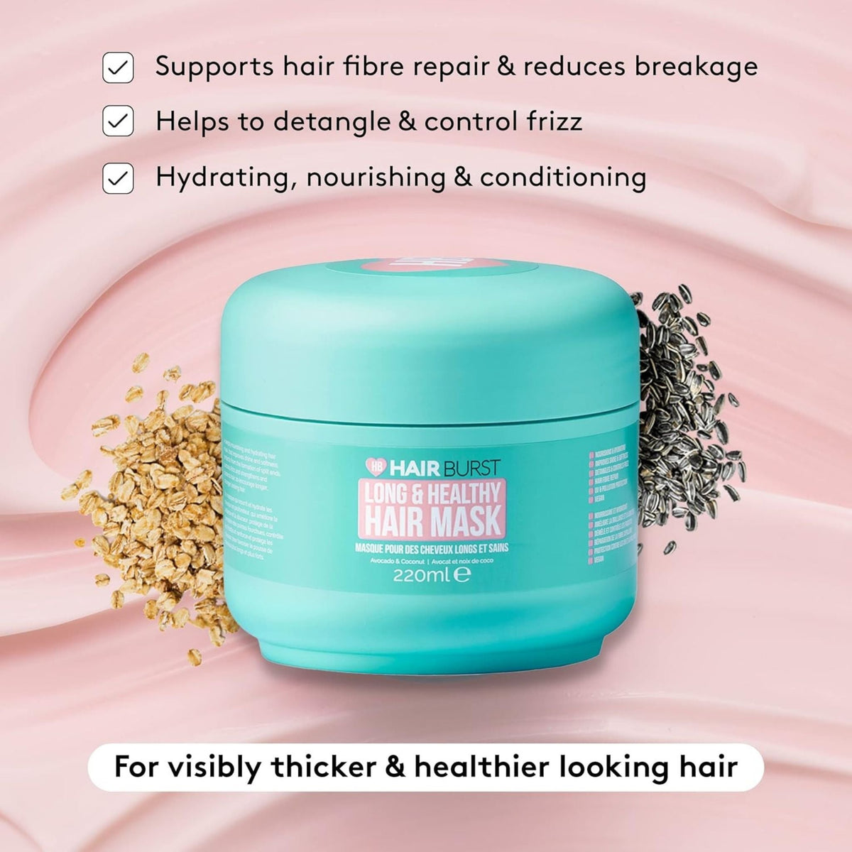 Refect Beauty Hair Burst Long & Healthy hair mask in a turquoise jar surrounded by oats and seeds on a pink background.