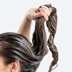 Refect Beauty Hair Burst shampoo and conditioner applied to wet hair to promote longer and stronger strands
