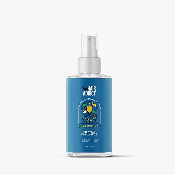 Refect Beauty The Hair Addict Honeycomb Vanilla hair perfume spray bottle with a blue label on a white background.