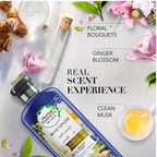 Refect Beauty Herbal Essences Blue Ginger conditioner bottle surrounded by ginger root, orchids, and botanical oils.