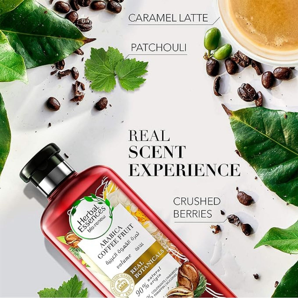 Refect Beauty Herbal Essences Arabica Coffee Fruit shampoo bottle surrounded by coffee beans and fresh green leaves with description