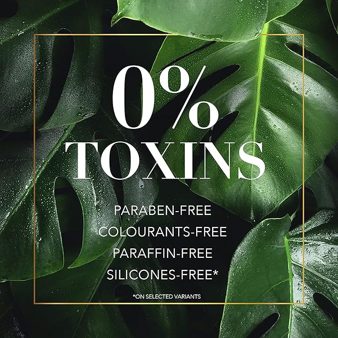 Refect Beauty Herbal Essences shampoo graphic highlighting 0% toxins, paraben-free, and silicone-free formula on leaves.