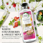 Refect Beauty Herbal Essences Bio:Renew White Strawberry & Sweet Mint shampoo bottle with fresh fruit and mint leaves