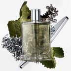 Refect Beauty Hermès H24 Eau de Parfum in a refillable glass bottle surrounded by clary sage leaves and moss.