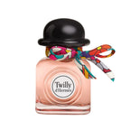Refect Beauty Hermès Twilly d’Hermès perfume bottle with a black cap and a colorful patterned silk ribbon tie.