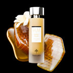 Refect Beauty Ibrahim Al Qurashi Honey Musk Confidence Dose perfume bottle with honeycomb and white flower accents