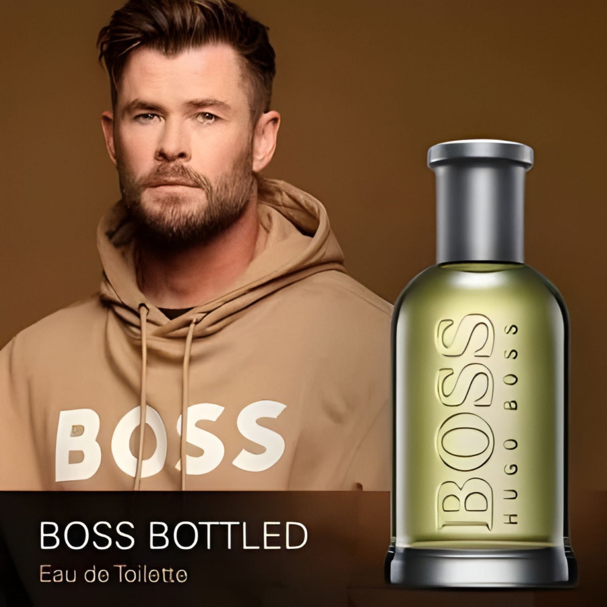 Refect Beauty Hugo Boss Bottled Eau de Toilette fragrance bottle next to a man in a beige hoodie