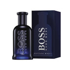 Refect Beauty Hugo Boss Bottled Night Eau de Toilette in a dark blue glass bottle next to its matching product box.