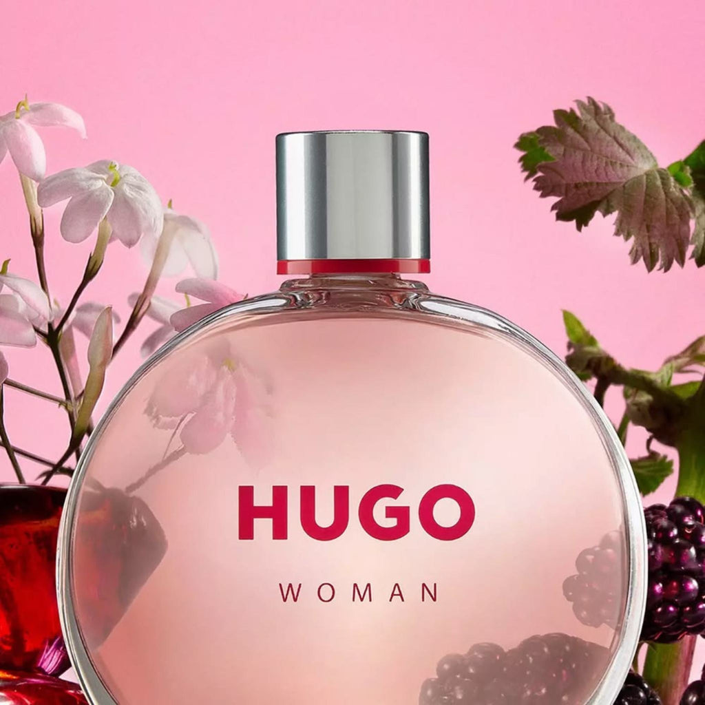 Refect Beauty Hugo Boss Extreme Eau de Parfum for women in a round glass bottle with floral and berry accents