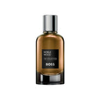 Refect Beauty Hugo Boss The Collection Noble Wood Eau de Parfum in a sleek glass bottle with a metallic silver cap.