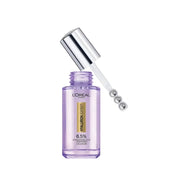 Refect Beauty L'Oreal Paris Hyaluron Expert eye serum in a purple glass bottle with a triple roller applicator.