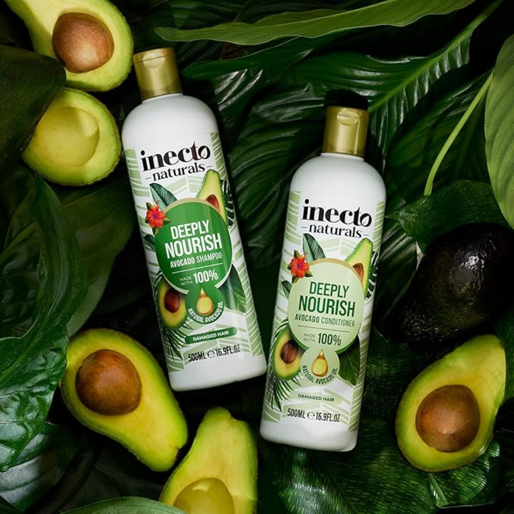 Refect Beauty Inecto Naturals avocado shampoo and conditioner bottles surrounded by fresh avocado halves and leaves