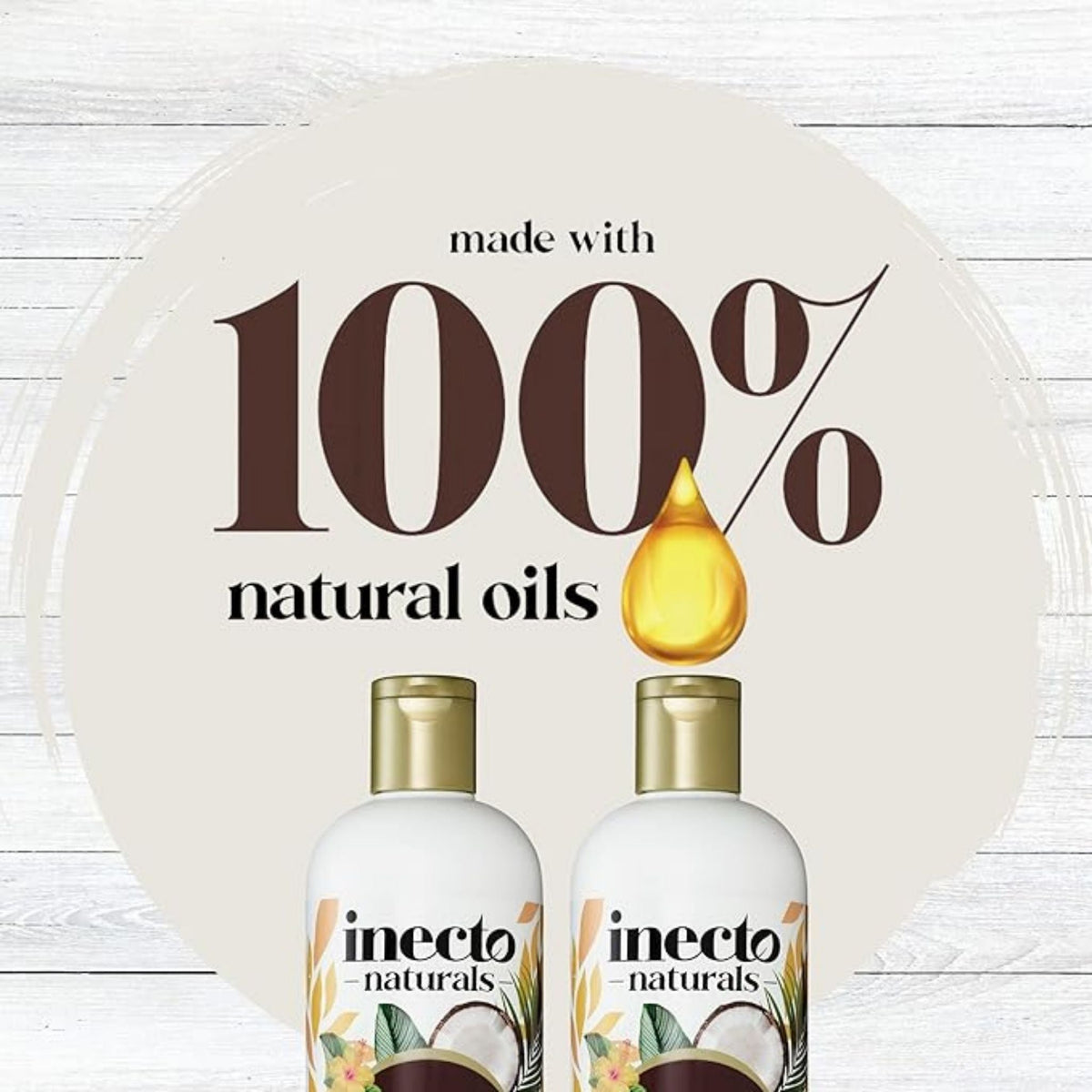 Refect Beauty Inecto Naturals coconut shampoo bottles featuring 100 percent natural oils branding on a wooden background