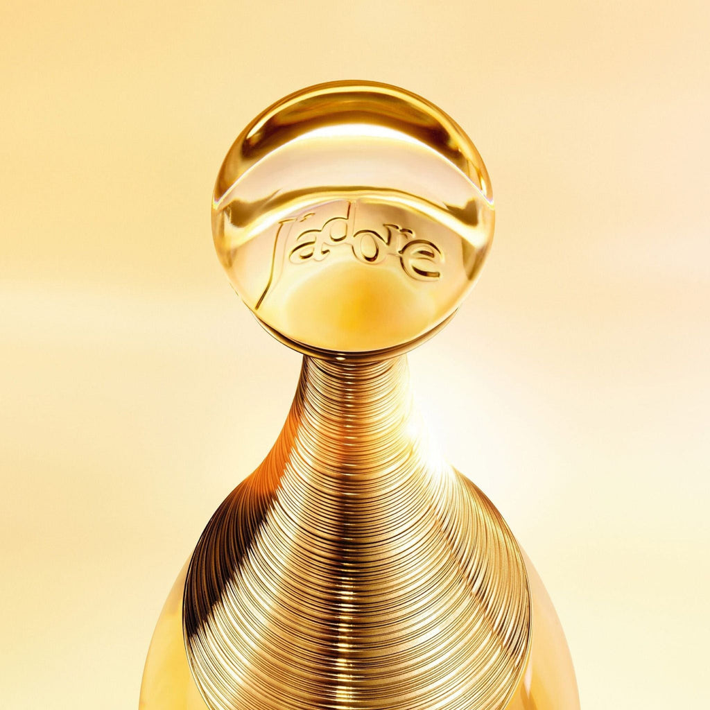 Refect Beauty Dior J'adore Eau de Parfum bottle featuring a golden ribbed neck and a spherical glass stopper