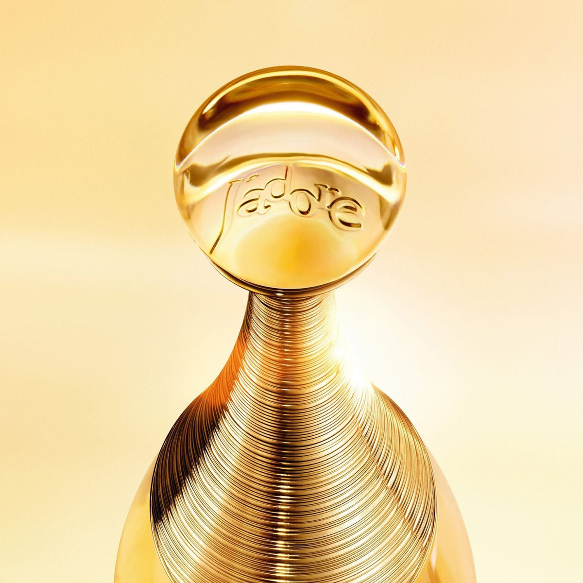 Refect Beauty Dior J'adore Eau de Parfum bottle featuring a golden ribbed neck and a spherical glass stopper