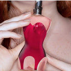 Refect Beauty Jean Paul Gaultier Classique Eau de Parfum bottle shaped like a woman's torso held by a woman