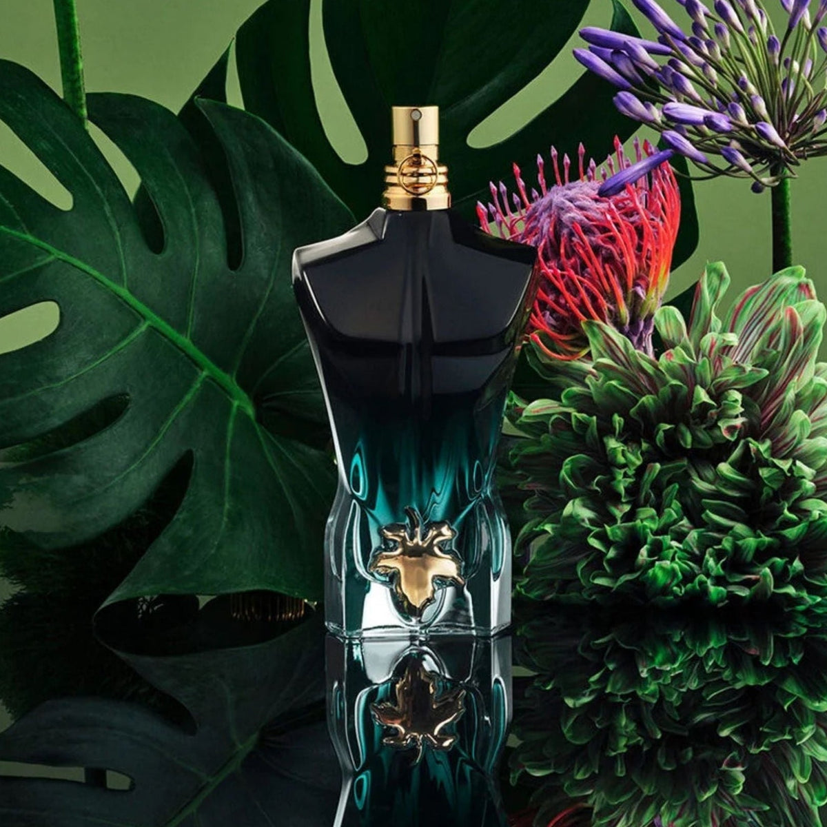 Refect Beauty Jean Paul Gaultier Le Beau Le Parfum bottle with black and green gradient torso and golden fig leaf.
