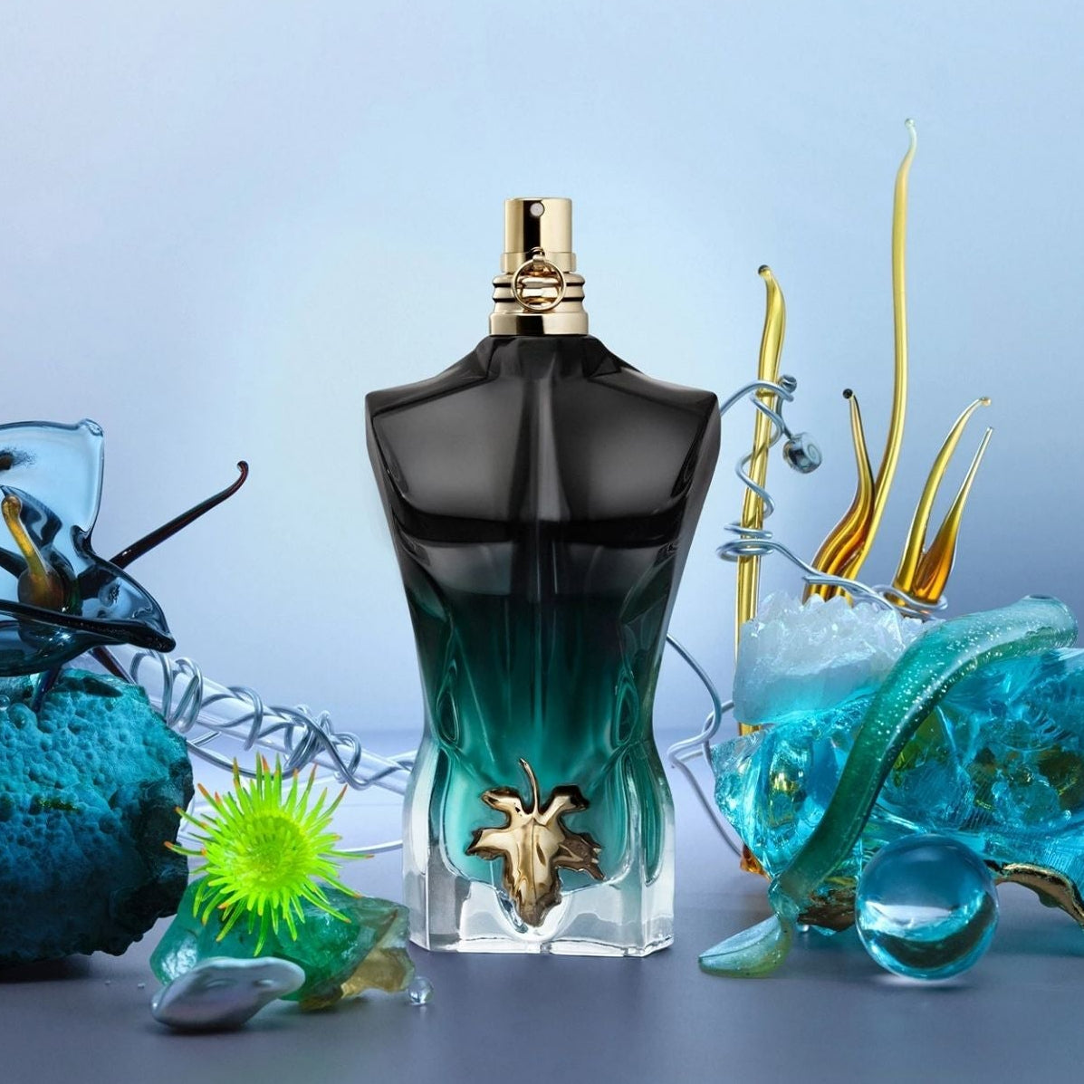 Refect Beauty Jean Paul Gaultier Le Beau Le Parfum bottle with black and green gradient torso and gold fig leaf detail