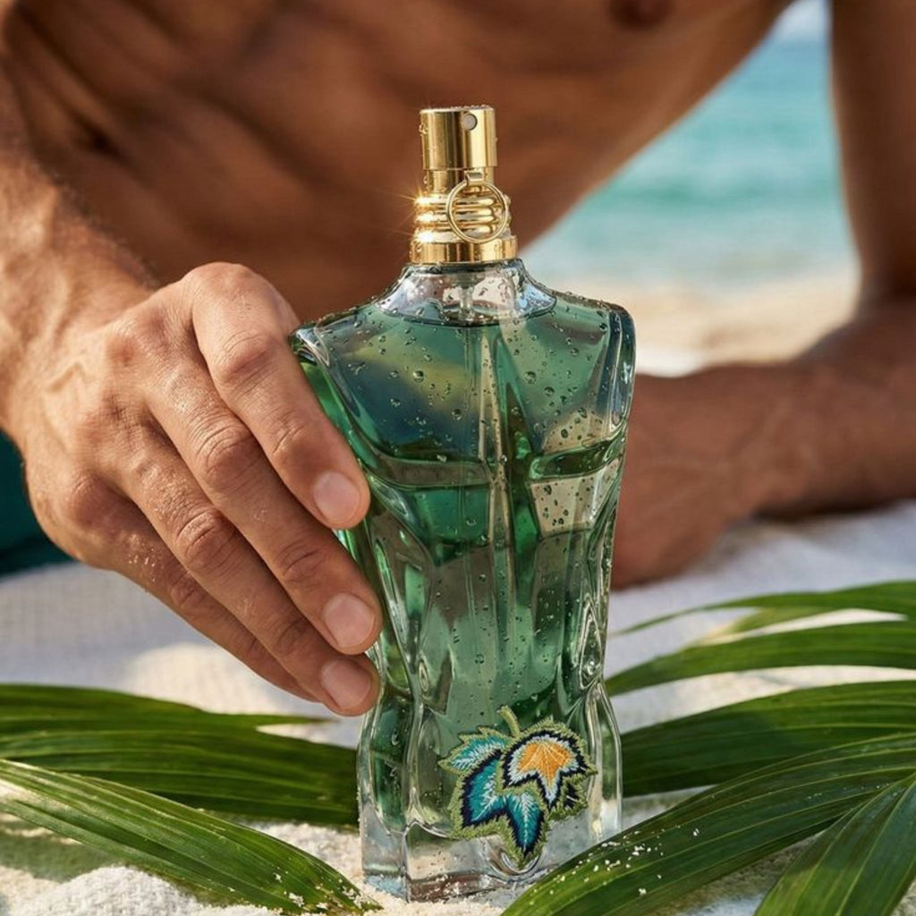 Refect Beauty Jean Paul Gaultier Le Beau Paradise Garden perfume bottle held by a man on a sunny tropical beach