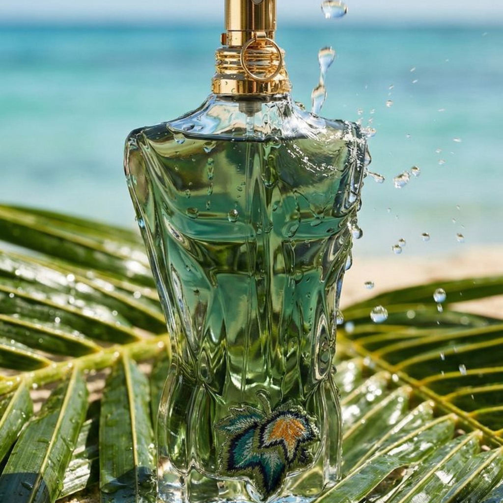 Refect Beauty Jean Paul Gaultier Le Beau Paradise Garden perfume bottle with tropical leaf embroidery on a beach
