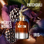 Refect Beauty Jean Paul Gaultier Scandal Elixir Parfum bottle with iconic legs cap, surrounded by blackberries and iris