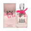 Refect Beauty Juicy Couture La La Eau de Parfum bottle with pink ribbon and matching metallic pink gift box packaging.