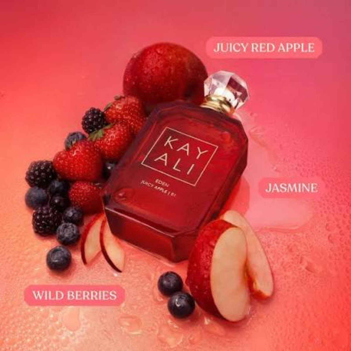 Refect Beauty Kayali Eden Juicy Apple 01 perfume bottle surrounded by fresh red apples, strawberries, and blueberries.