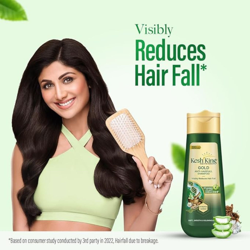 Refect Beauty Kesh King anti-hair fall shampoo bottle with aloe vera, featuring a woman holding a wooden hair brush.